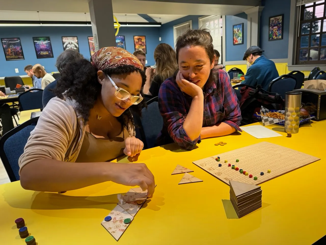 Two players enjoying MetroNet, including scoreboard.